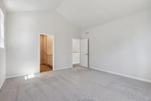 a bathroom with a sink double vanity and a mirror