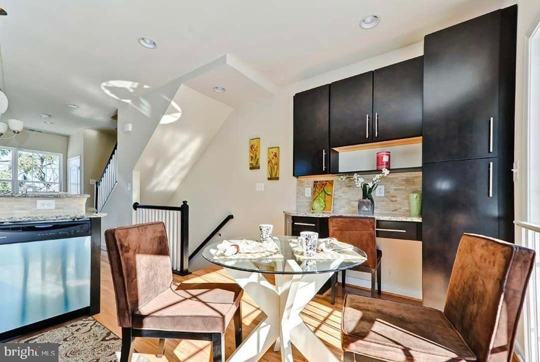 1406 22nd Street Southeast, Unit F Washington, DC 20020 - Photo 14 of 24 Bright and inviting dining space awaits you.