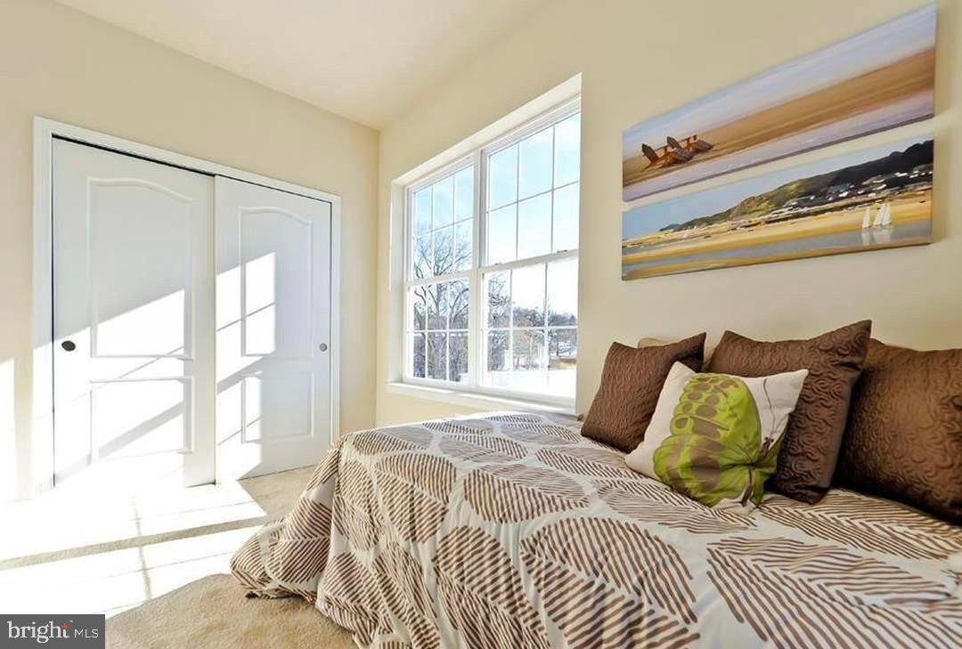 1406 22nd Street Southeast, Unit F Washington, DC 20020 - Photo 18 of 24 Bright and airy bedroom with scenic views.