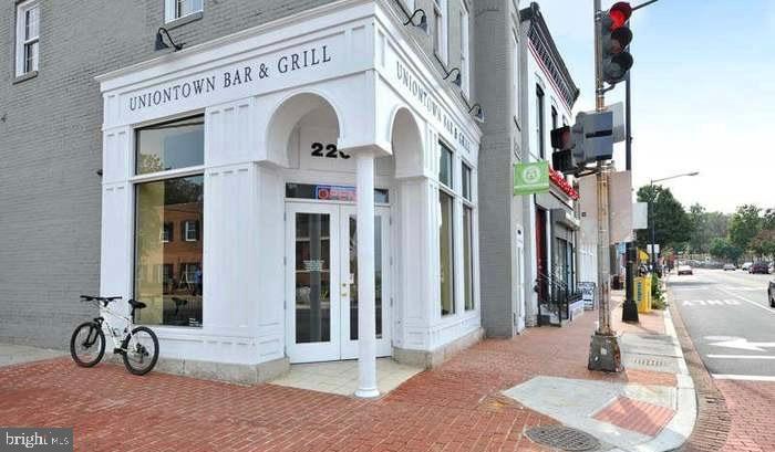 1406 22nd Street Southeast, Unit F Washington, DC 20020 - Photo 24 of 24 Charming corner bar and grill awaits patrons.