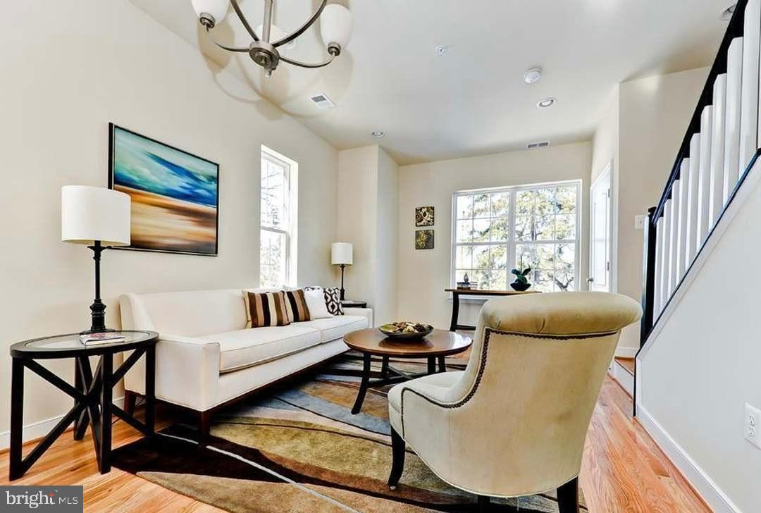 1406 22nd Street Southeast, Unit F Washington, DC 20020 - Photo 3 of 24 Bright and inviting living space with charm.