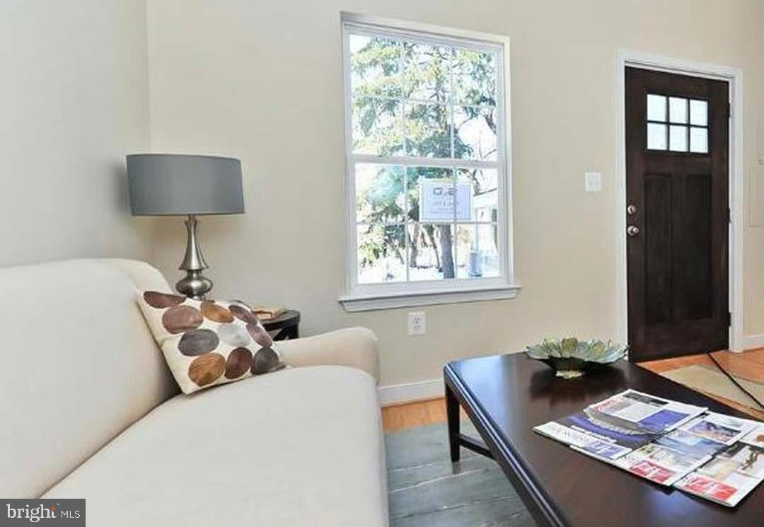 1406 22nd Street Southeast, Unit F Washington, DC 20020 - Photo 4 of 24 Bright and inviting living space awaits you.