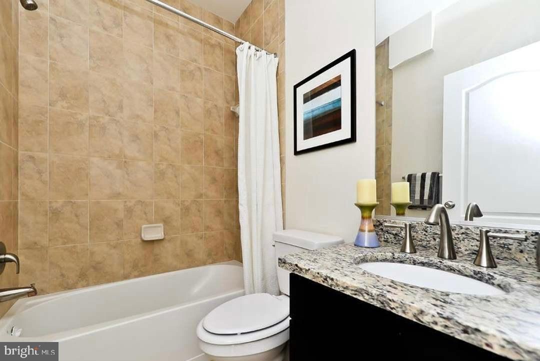 1406 22nd Street Southeast, Unit F Washington, DC 20020 - Photo 10 of 24 Modern bathroom with elegant finishes.