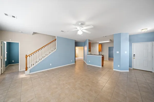 a kitchen with granite countertop a stove and a sink
