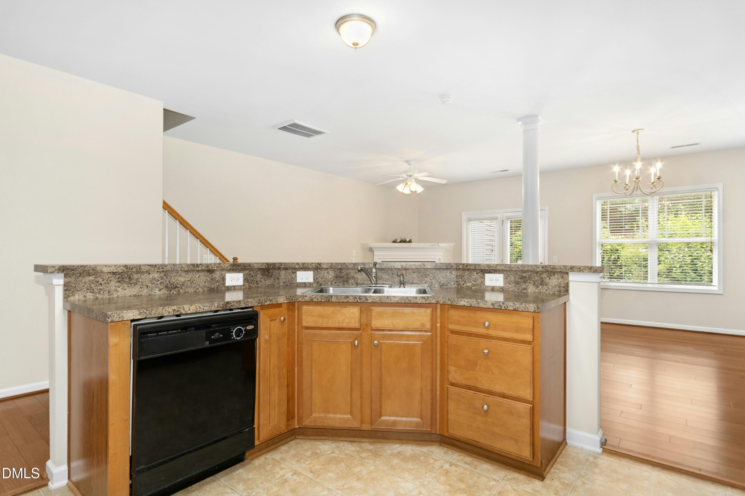 5541 Nur Lane Raleigh, NC 27606 - Photo 14 of 33 a kitchen with a sink and cabinets