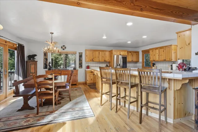 a large kitchen with lots of counter space a sink and appliances
