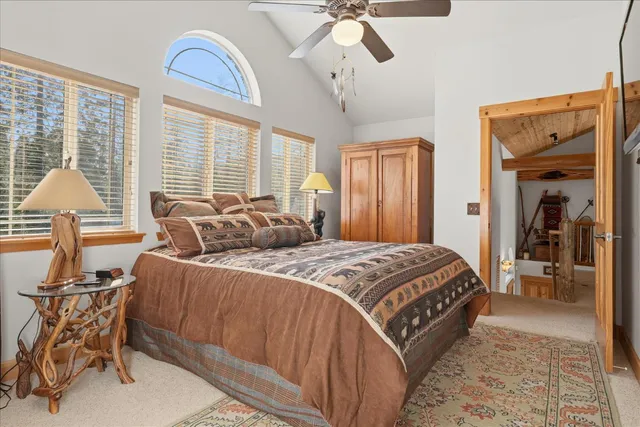 a view of a chair and table in backyard