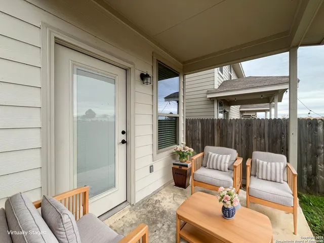a outdoor space with patio the couches and a dining table with garden view