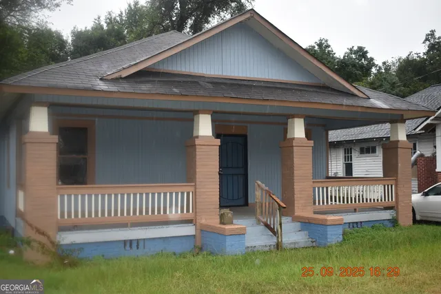 a view of a house with a deck