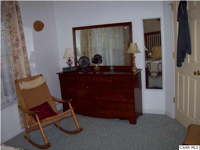 5619 Fredericksburg Road Ruckersville, VA 22968 - Photo 13 of 29 a room with furniture and gym equipment