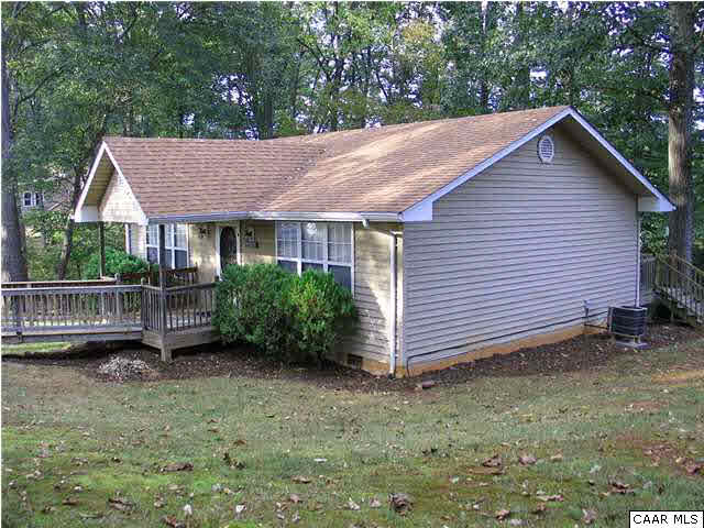 5619 Fredericksburg Road Ruckersville, VA 22968 - Photo 2 of 29 a view of a house with a yard and sitting area