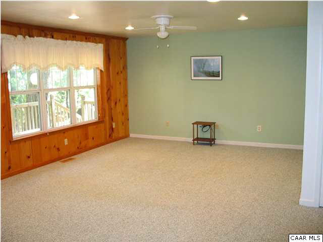 5619 Fredericksburg Road Ruckersville, VA 22968 - Photo 4 of 29 an empty room with a window