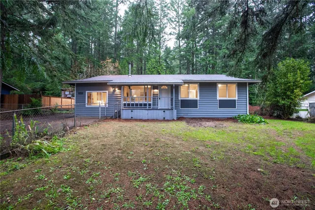 front view of a house with a yard