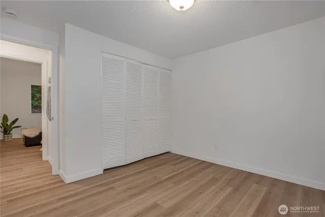 a view of storage and utility room with washer and dryer