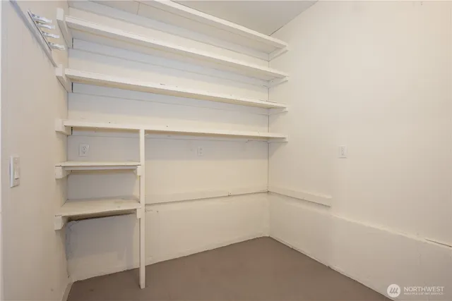 a view of a wooden deck and a yard