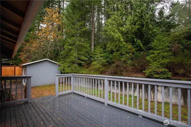 a view of balcony with wooden floor