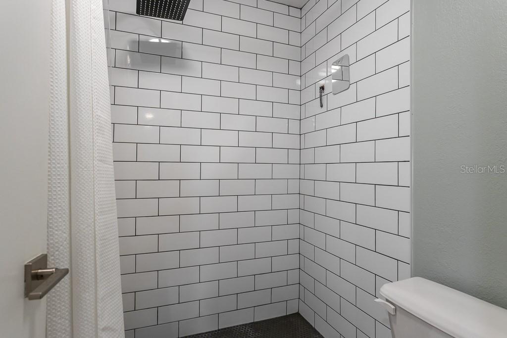 100 Ingrid Place Oldsmar, FL 34677 - Photo 22 of 51 a bathroom with a shower