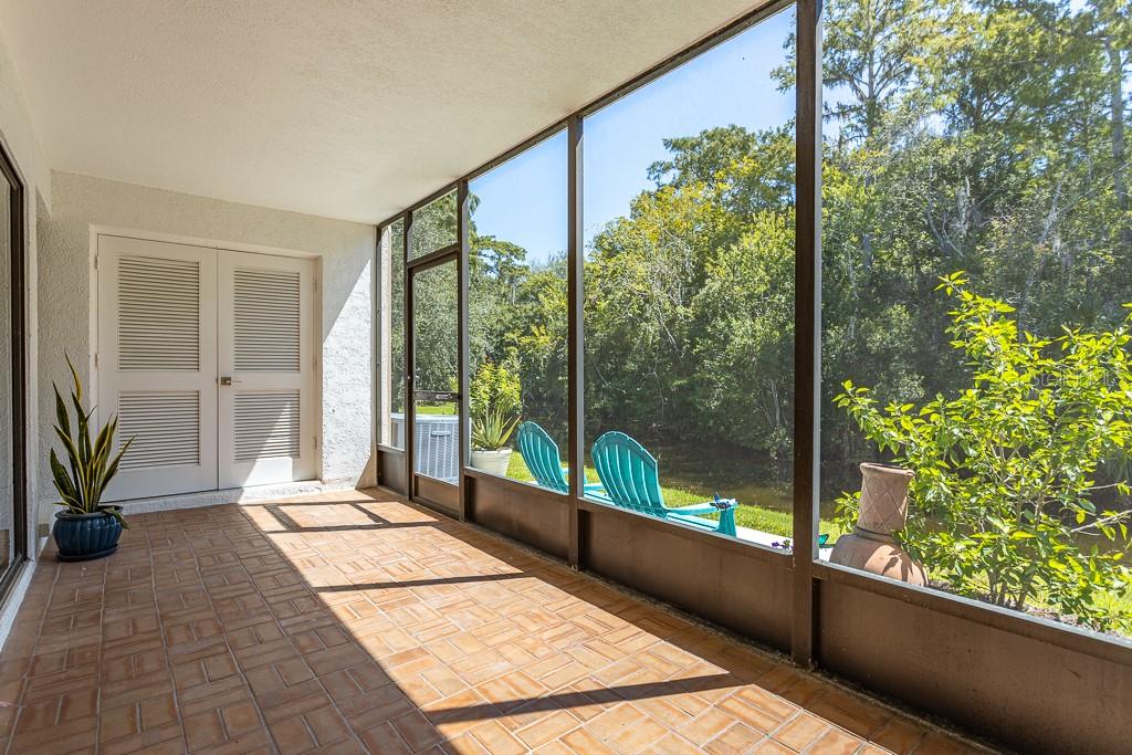 100 Ingrid Place Oldsmar, FL 34677 - Photo 28 of 51 a building with trees in front of it