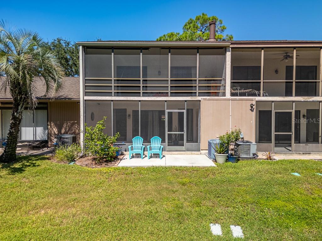 100 Ingrid Place Oldsmar, FL 34677 - Photo 32 of 51 front view of house with a yard