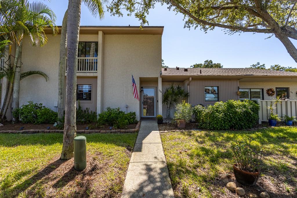 100 Ingrid Place Oldsmar, FL 34677 - Photo 34 of 51 a front view of a house with garden