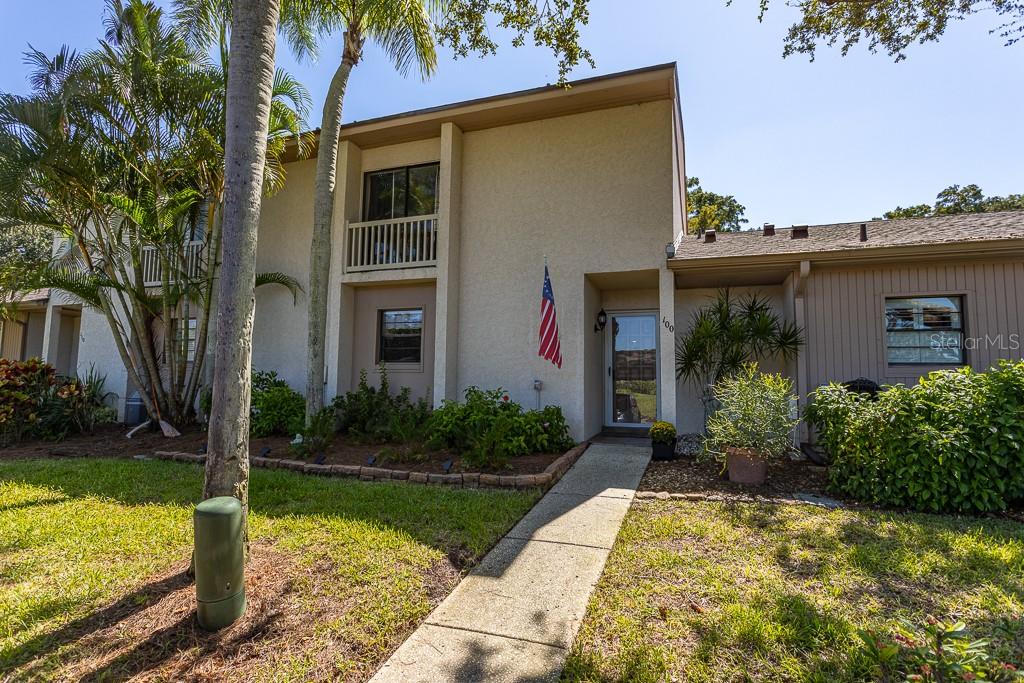 100 Ingrid Place Oldsmar, FL 34677 - Photo 35 of 51 a front view of a house with garden