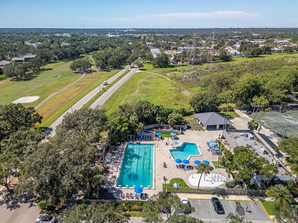 100 Ingrid Place Oldsmar, FL 34677 - Photo 47 of 51 an aerial view of residential houses with outdoor space and swimming pool