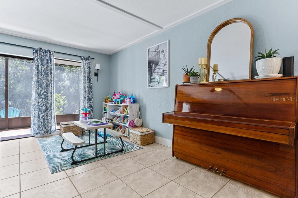 100 Ingrid Place Oldsmar, FL 34677 - Photo 6 of 51 a living room with furniture