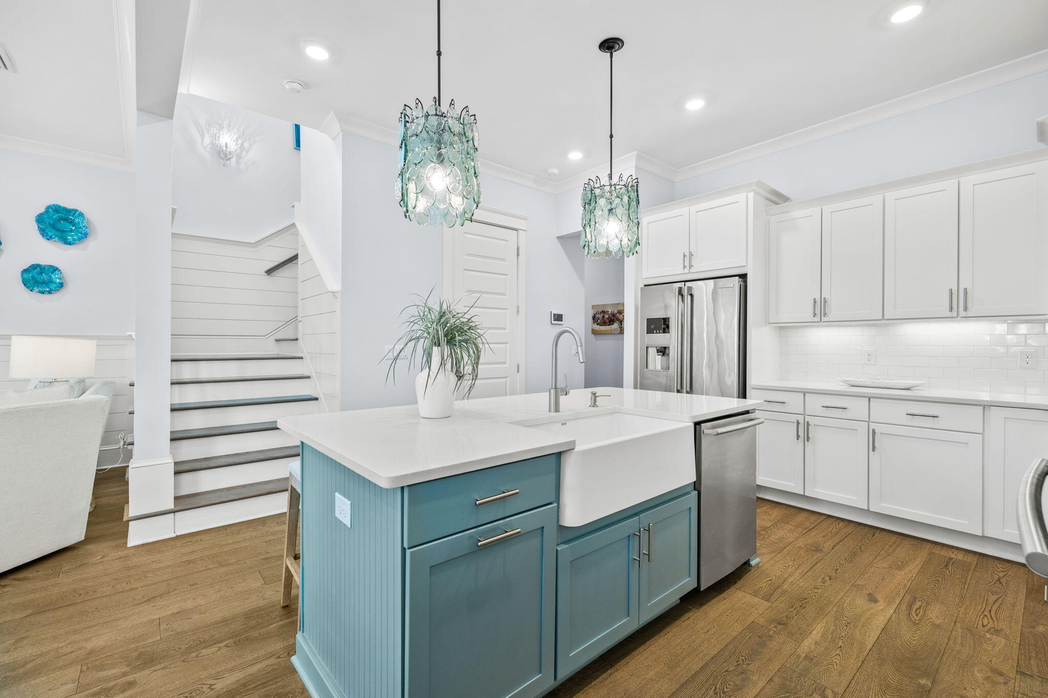 27 Siasconset Ln Inlet Beach Inlet Beach, FL 32461 - Photo 13 of 63 a kitchen with a sink chandelier and refrigerator