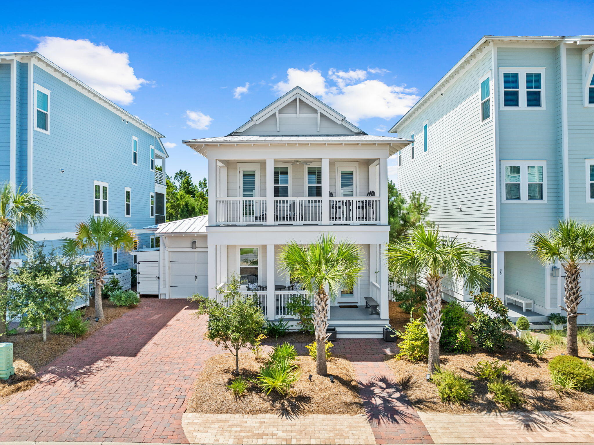 27 Siasconset Ln Inlet Beach Inlet Beach, FL 32461 - Photo 3 of 63 a front view of a house with garden