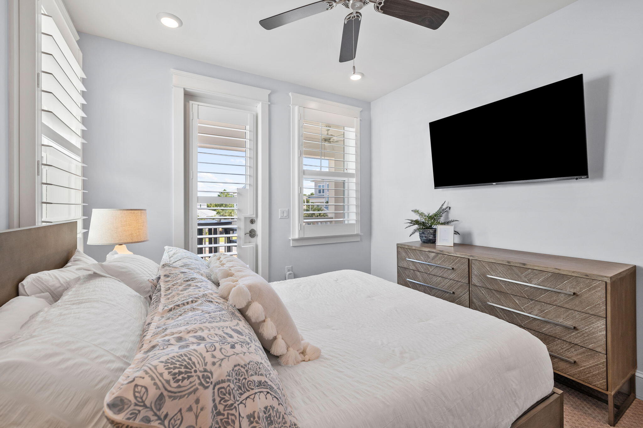 27 Siasconset Ln Inlet Beach Inlet Beach, FL 32461 - Photo 31 of 63 a bedroom with a large bed and a flat screen tv