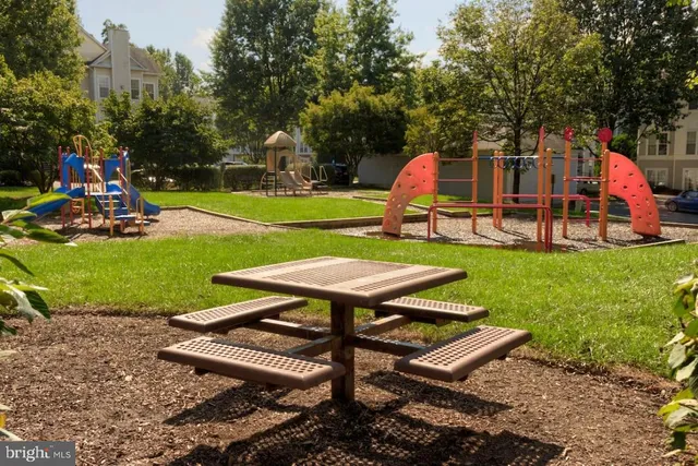 an outdoor sitting area with golf course