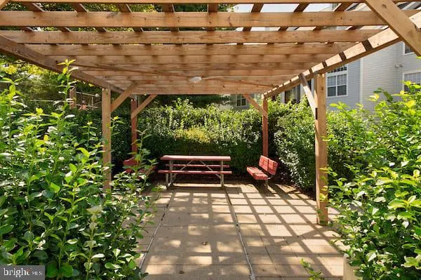 a backyard of a house with outdoor seating