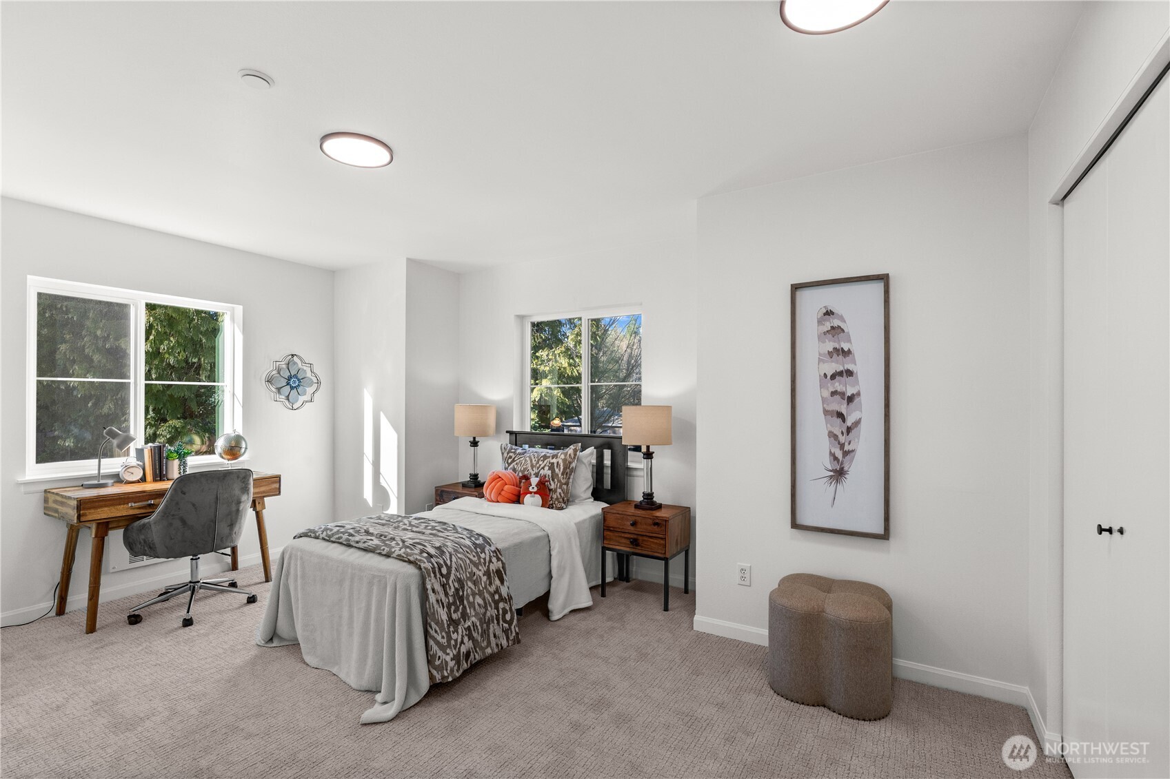 23202 Fitzgerald Road, Unit 1 Bothell, WA 98021 - Photo 16 of 21 a bedroom with bed and a window