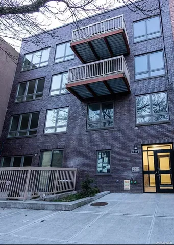 a front view of a house with a porch