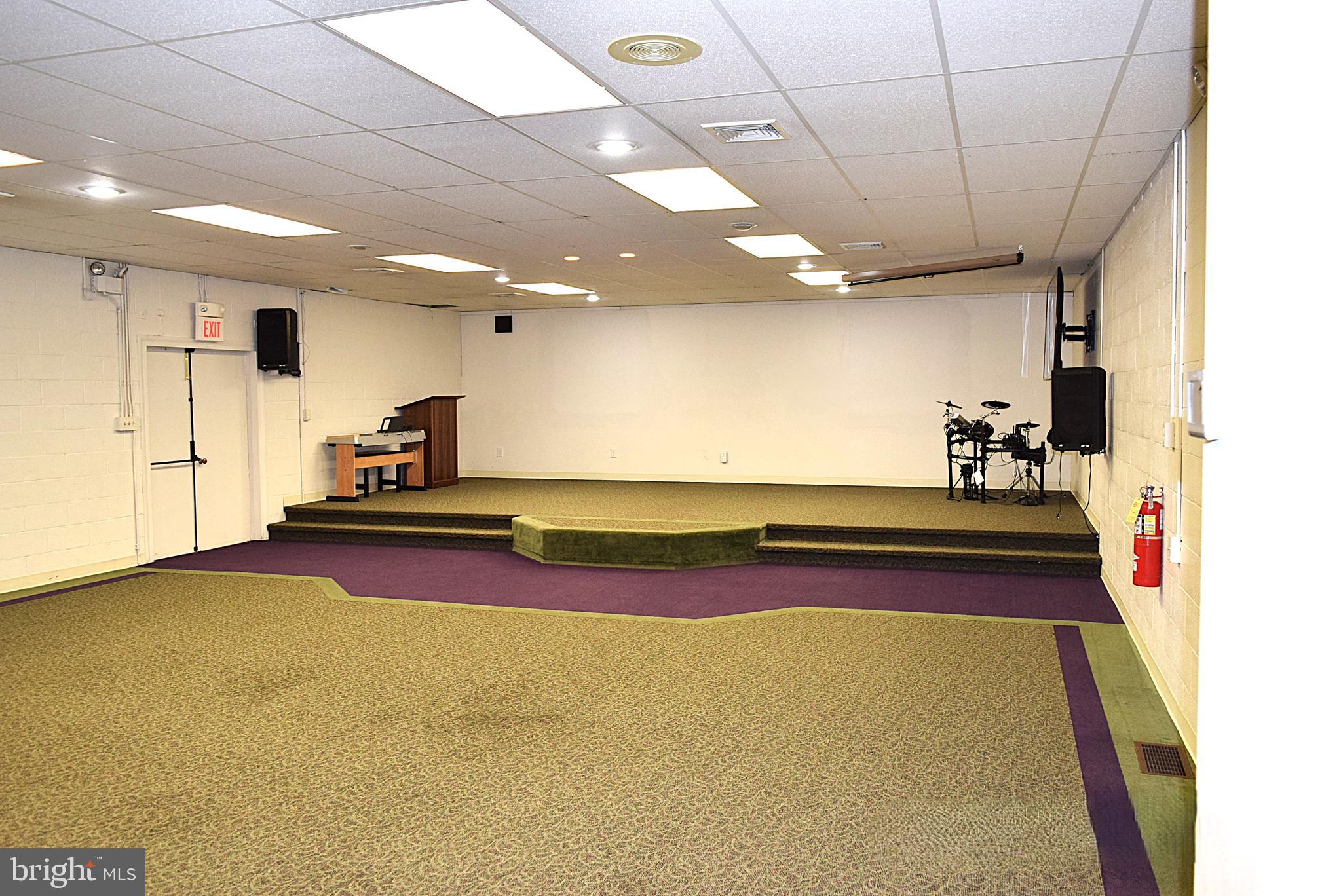 740 Edgegrove Road Hanover, PA 17331 - Photo 25 of 50 currently the sanctuary, Large room with a stage