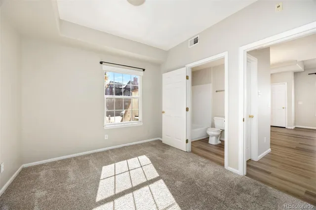 a view of a room with a bathroom