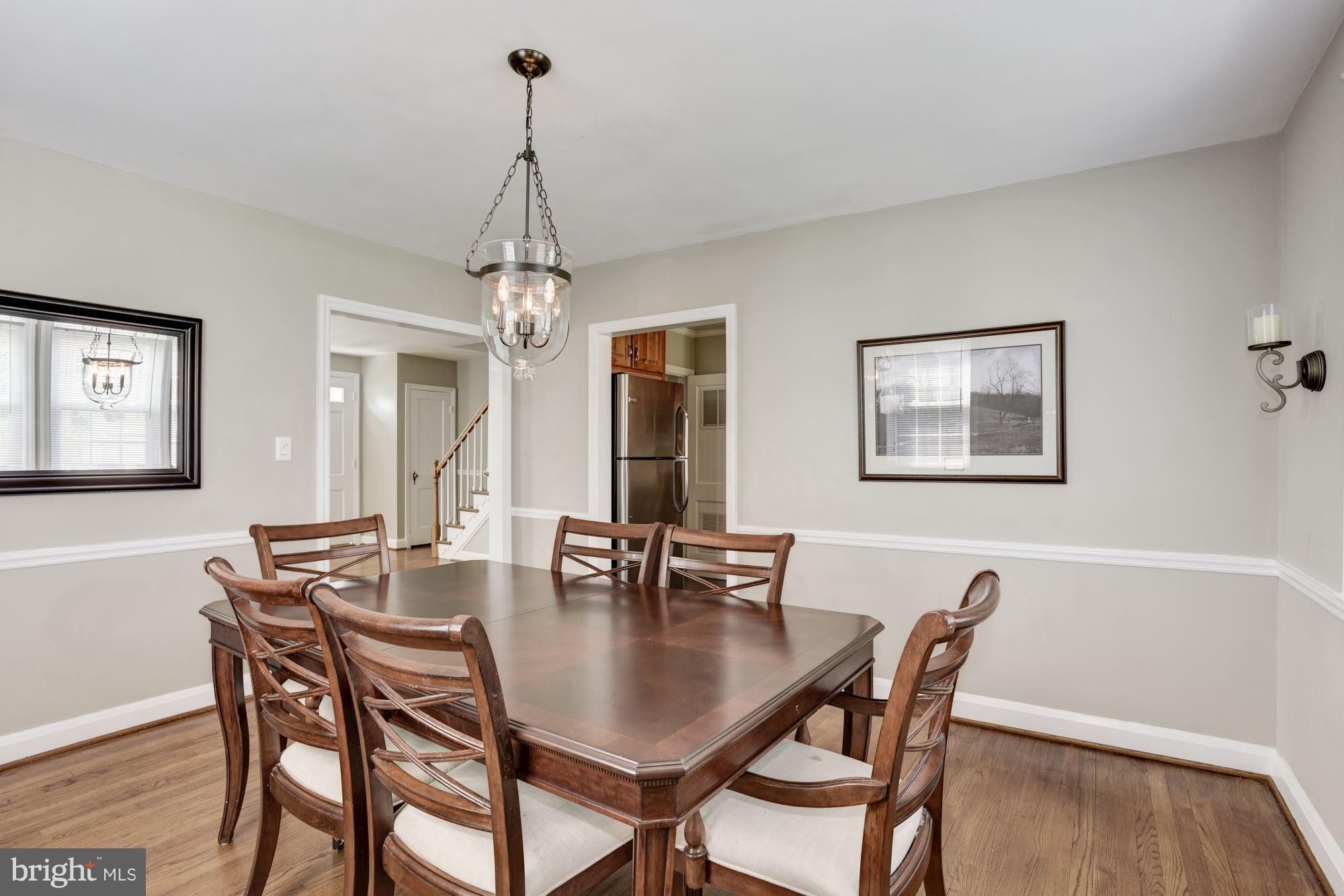 420 Stratford Road Baltimore, MD 21228 - Photo 8 of 26 a dining room with furniture and window