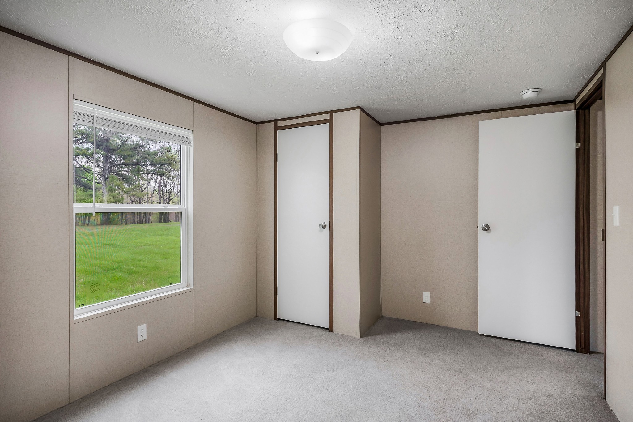 285 Toad Road Dowelltown, TN 37059 - Photo 18 of 31 a view of an empty room with a window