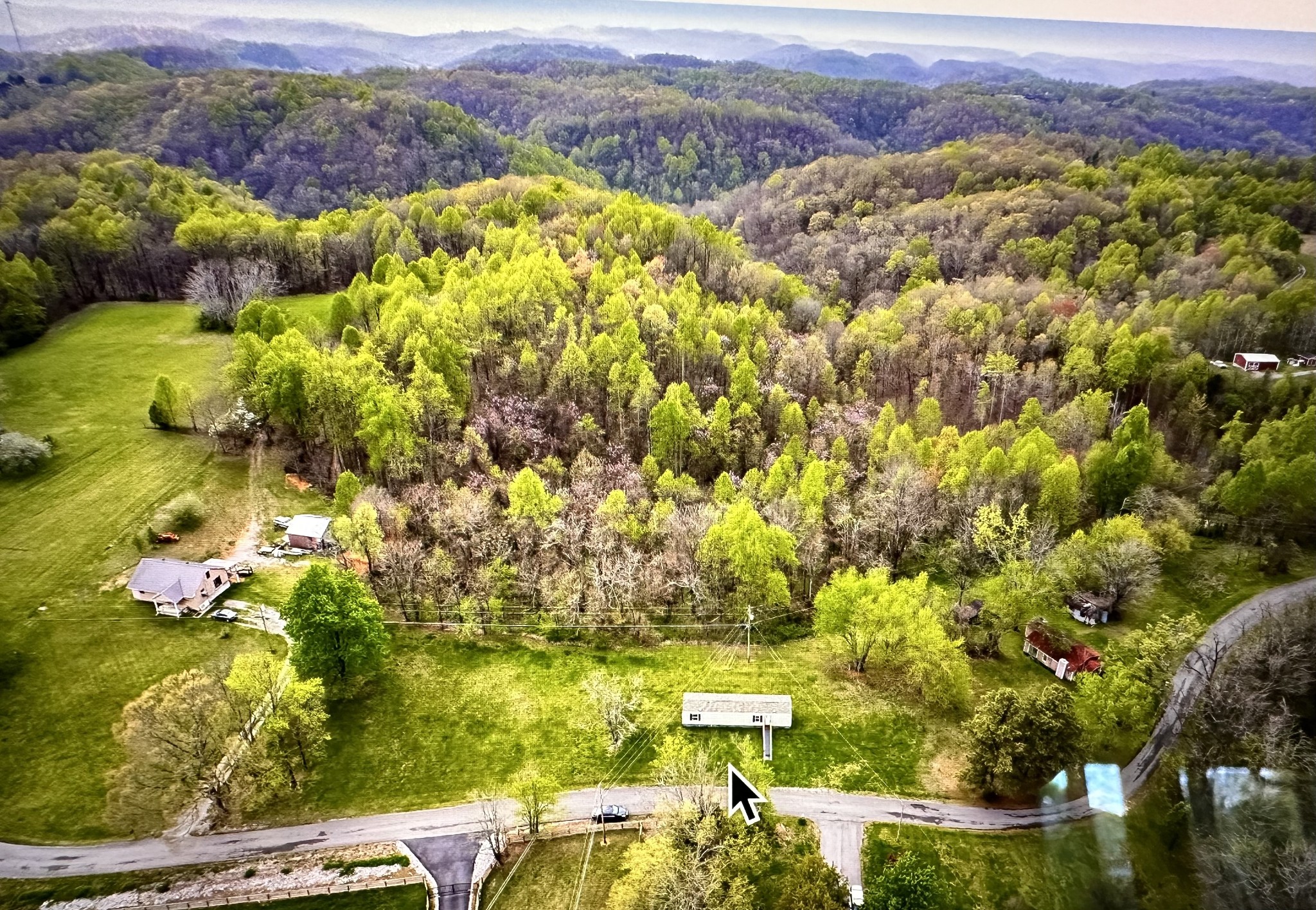 285 Toad Road Dowelltown, TN 37059 - Photo 20 of 31 a view of a city with mountains in the background