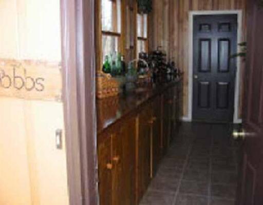 1036 Rudy Court Goodview, VA 24095 - Photo 5 of 5 a view of a entryway door front of house