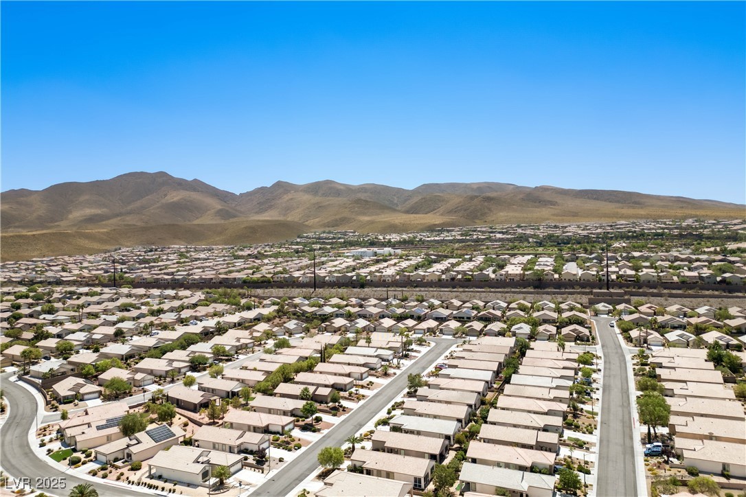 2563 Sargon Street Henderson, NV 89044 - Photo 33 of 35 Aerial view of residential area featuring a mountainous background