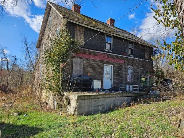 front view of house with a yard