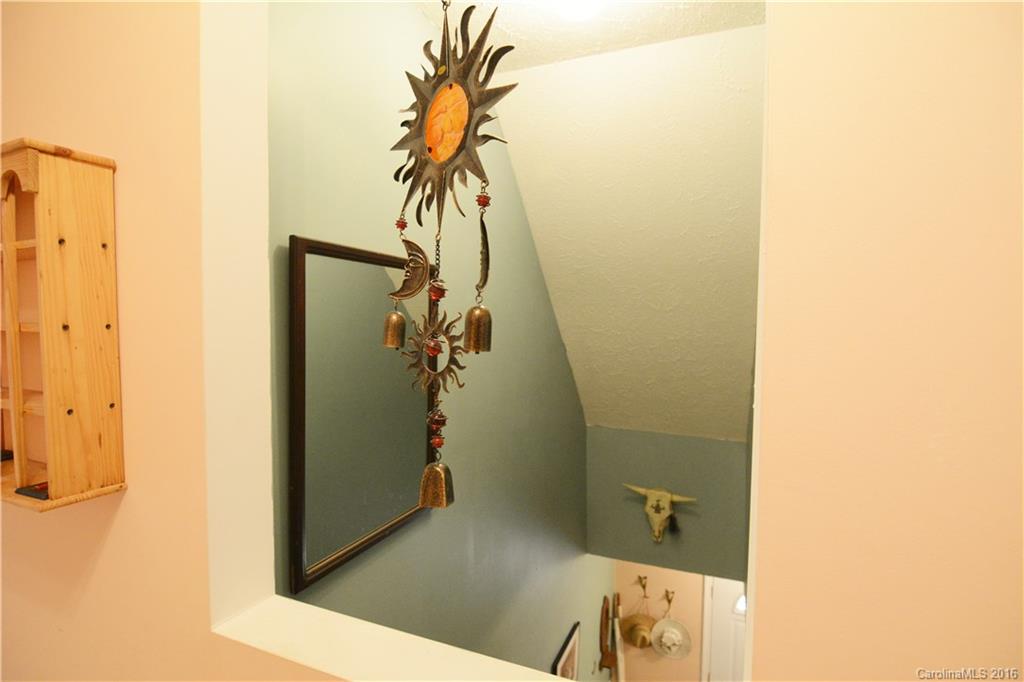 165 Valley Springs Road Olin, NC 28660 - Photo 14 of 21 a bathroom with a shower and a sink