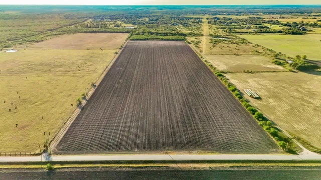 an aerial view of beach and ocean