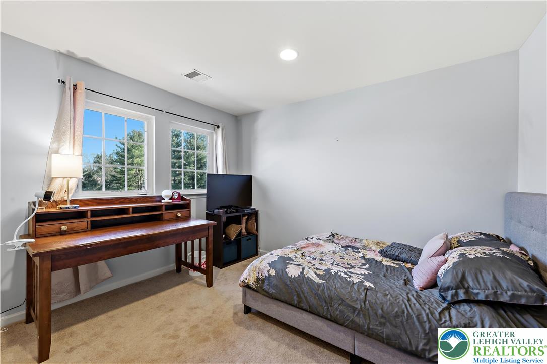 130 Lower Way Road Easton, PA 18045 - Photo 37 of 56 a bedroom with a bed and large windows