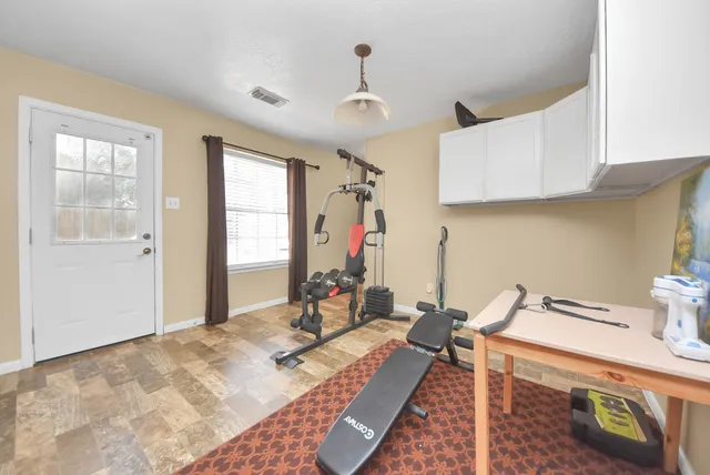 a bed room with a bed and a window