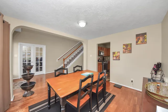 a room with furniture and wooden floor