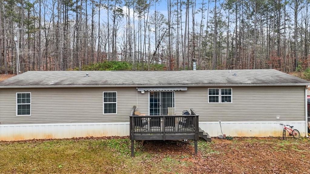 1075 Johnson Brady Road Canton, GA 30115 - Photo 25 of 33 a backyard of a house