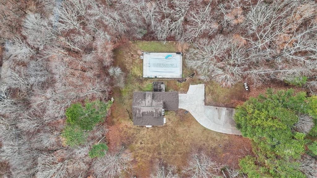 1075 Johnson Brady Road Canton, GA 30115 - Photo 7 of 33 a view of a bench in a garden