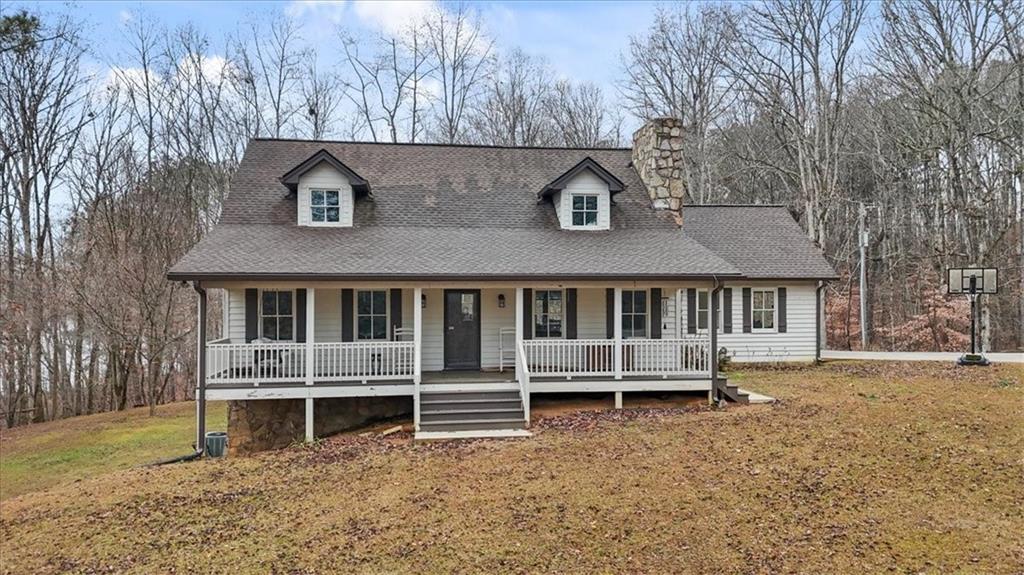 1075 Johnson Brady Road Canton, GA 30115 - Photo 8 of 33 a view of a house with a yard and sitting area